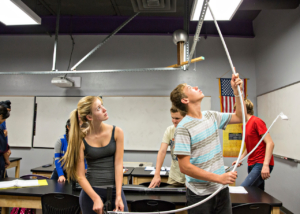 BASIS.ed high school students in science class